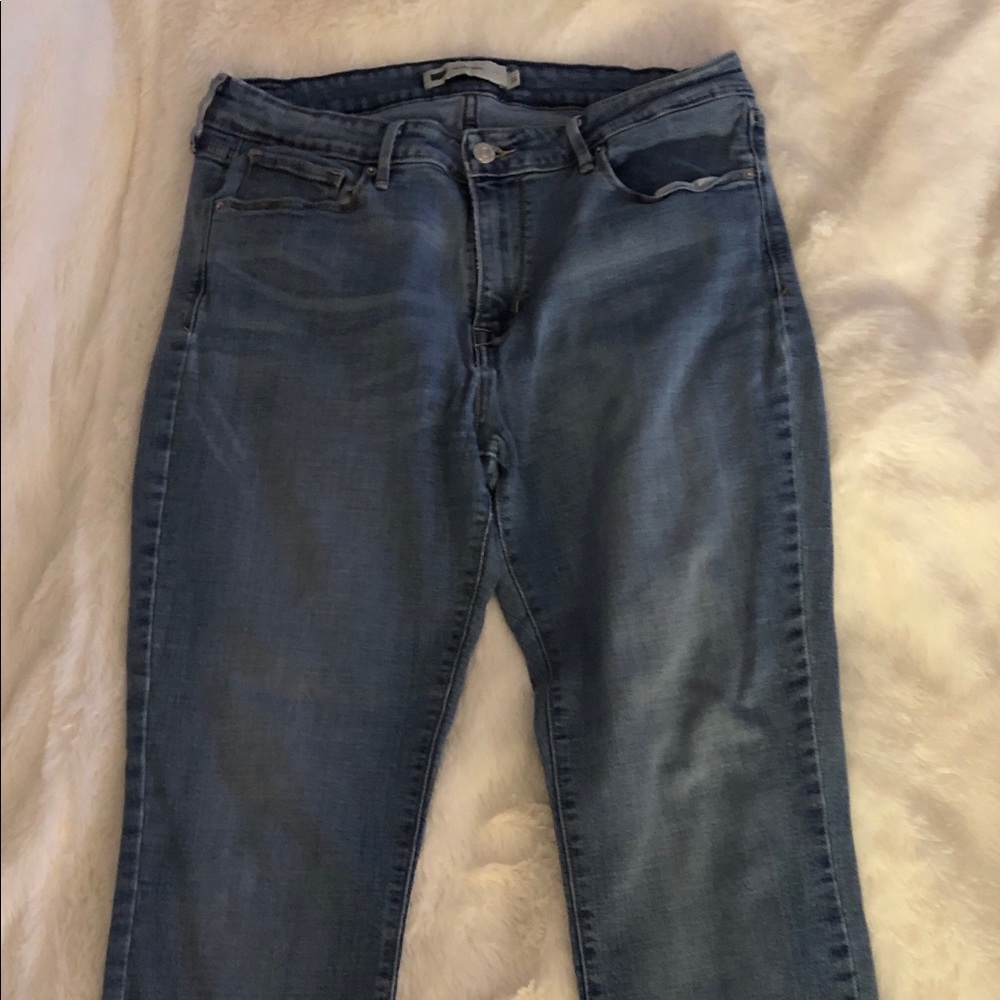 Levi’s mid-rise skinny jeans, light/medium wash